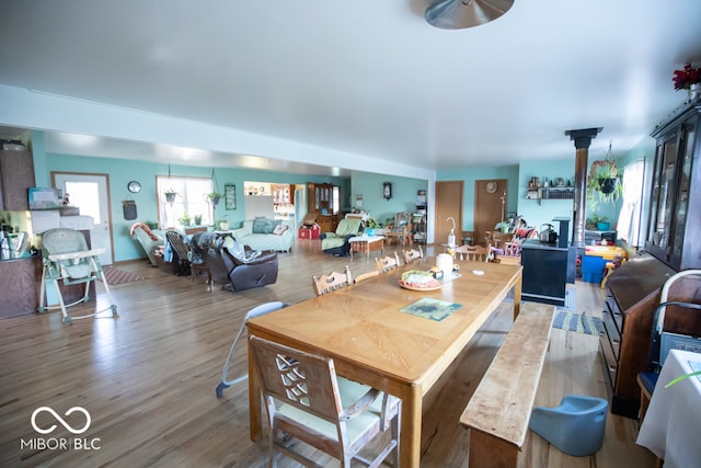 dining room with wood-type flooring