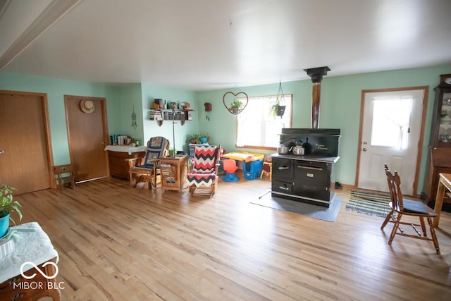 6255 E County Road 850 N, North Vernon, IN 47265 - living room featuring a wood stove and wood finished floors