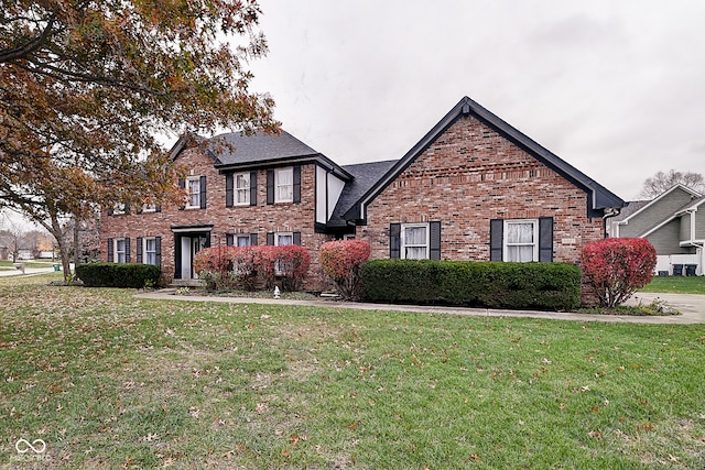 view of front of property with a front lawn