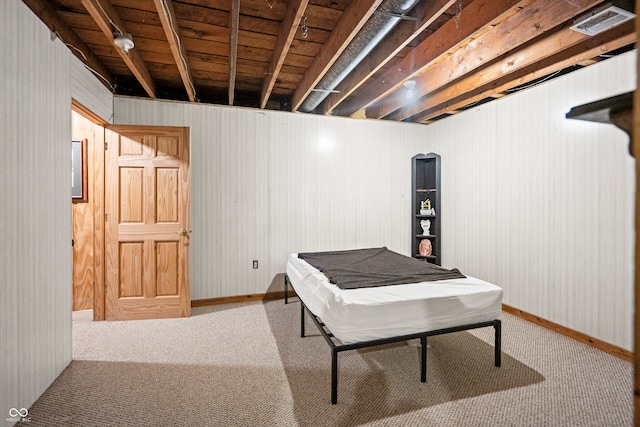 interior space with baseboards and carpet floors