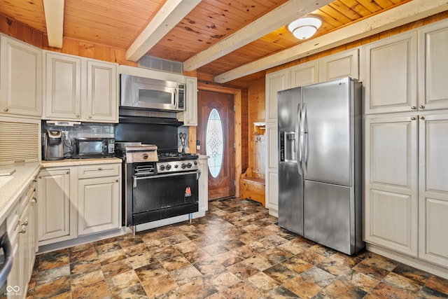 kitchen with cream cabinets, wood ceiling, and stainless steel appliances