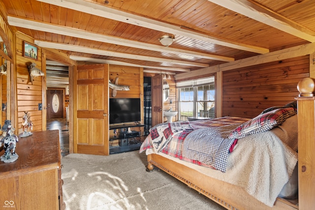 bedroom with carpet, wooden walls, wood ceiling, and beamed ceiling