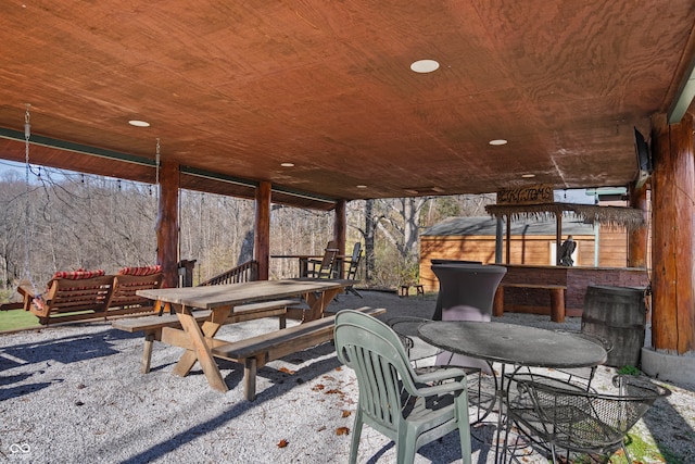 view of patio featuring outdoor dining area