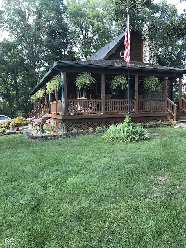 view of yard featuring a porch