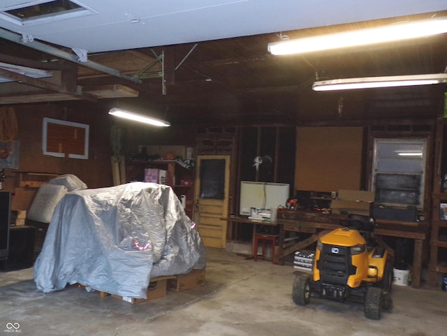 garage featuring a workshop area