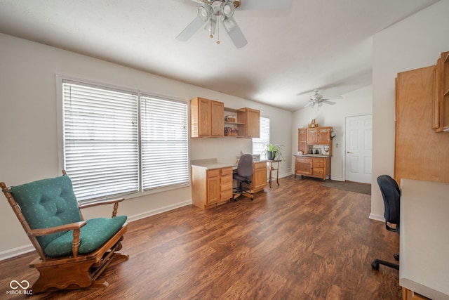 office featuring dark hardwood / wood-style floors, ceiling fan, and lofted ceiling