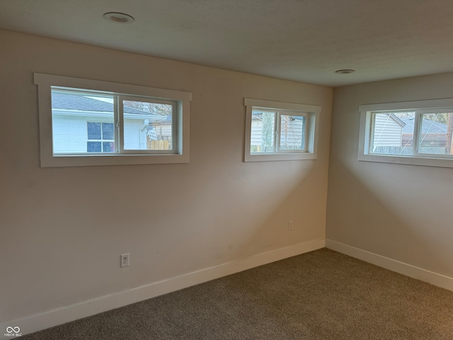 spare room featuring carpet flooring