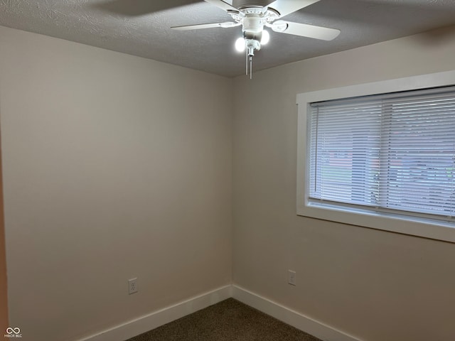 unfurnished room with a textured ceiling and ceiling fan