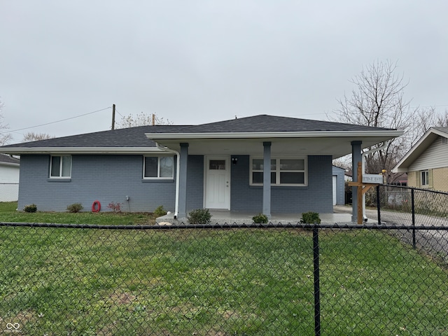 ranch-style house with a porch and a front yard