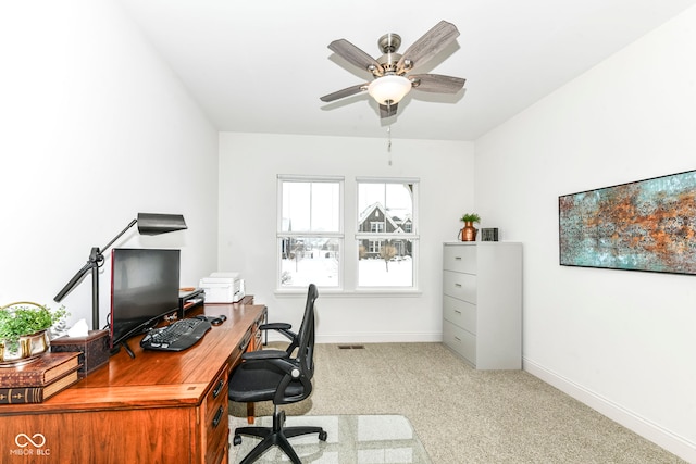 office featuring carpet floors and ceiling fan