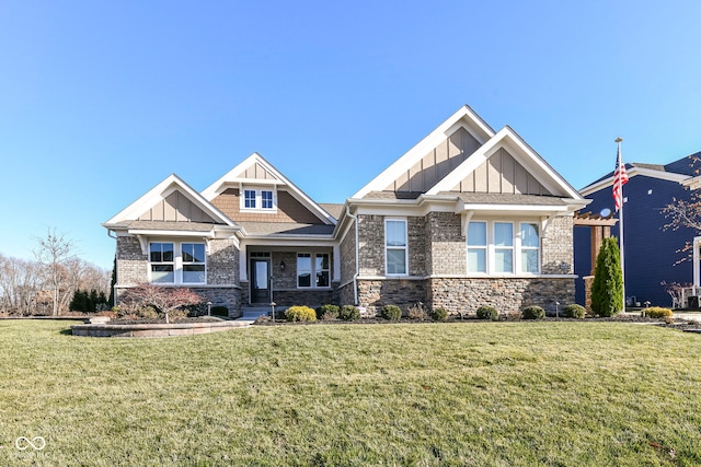 craftsman house featuring a front yard