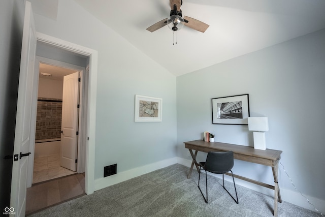 office with ceiling fan, light colored carpet, and lofted ceiling