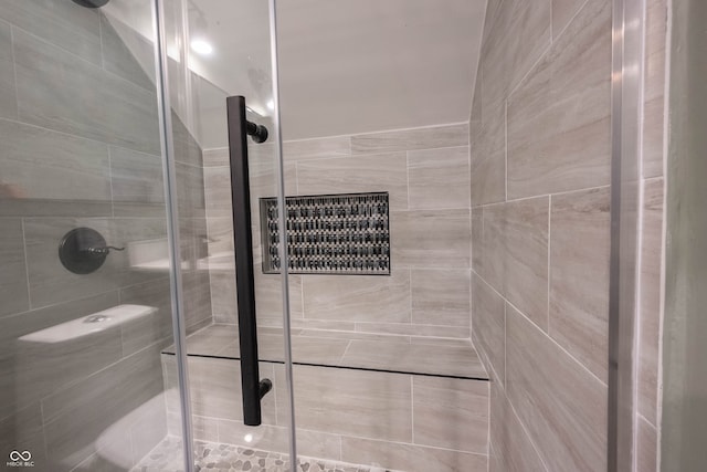 bathroom featuring walk in shower