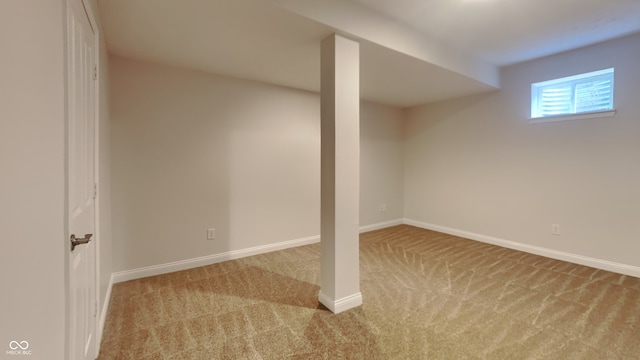 basement with light colored carpet