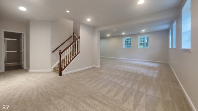 basement with light colored carpet