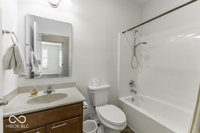 full bathroom featuring toilet, bathtub / shower combination, and vanity