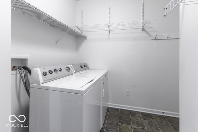 laundry area with washing machine and dryer