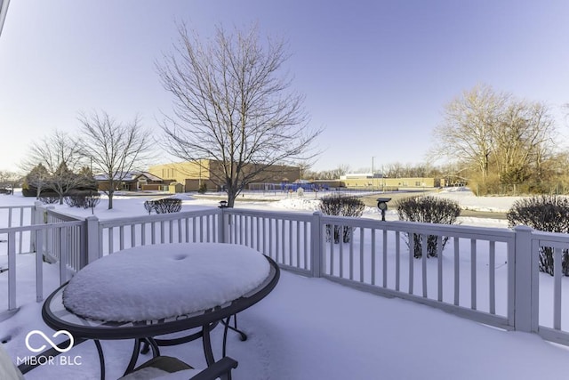 view of snow covered patio