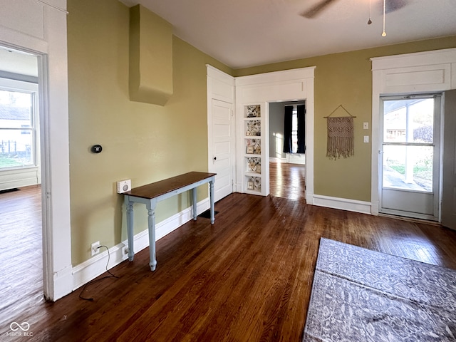 entryway featuring dark hardwood / wood-style floors and ceiling fan