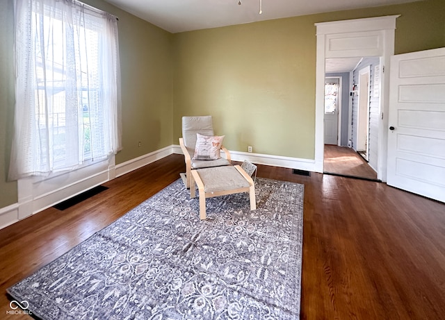 sitting room featuring hardwood / wood-style flooring