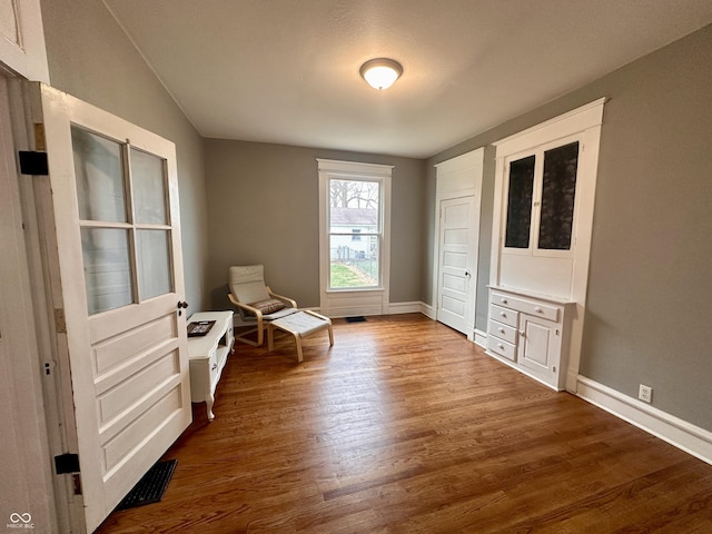 unfurnished room featuring wood-type flooring