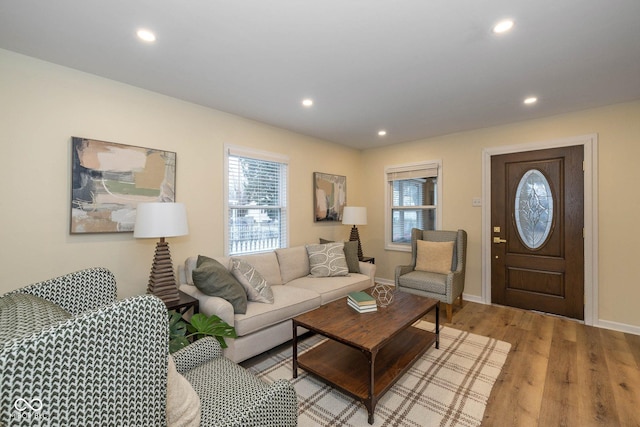 living room with light hardwood / wood-style flooring