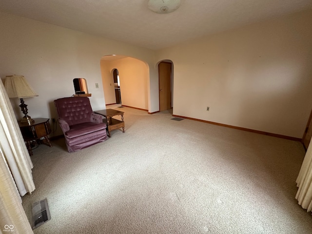 sitting room with light carpet