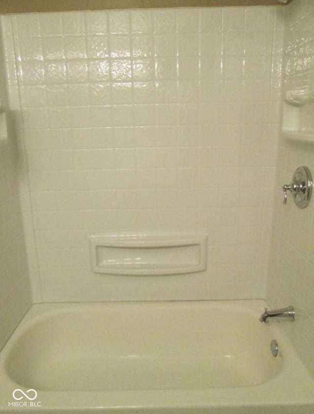 bathroom featuring washtub / shower combination