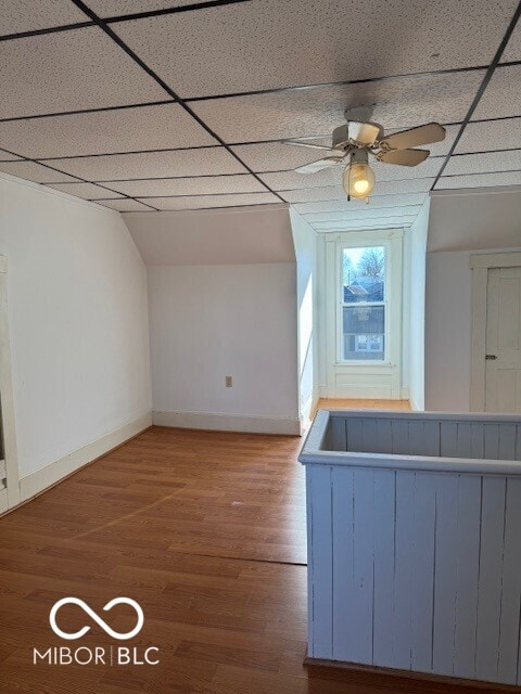 additional living space with wood-type flooring and ceiling fan