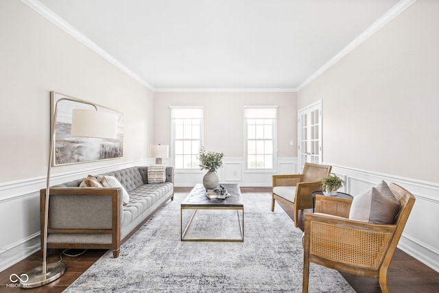 living room featuring crown molding and hardwood / wood-style flooring