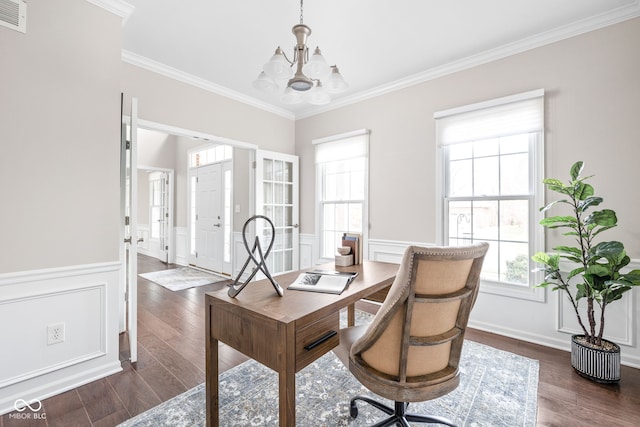 home office featuring dark hardwood / wood-style floors, crown molding, and a chandelier