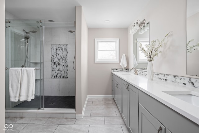 bathroom with vanity, tile patterned floors, and an enclosed shower