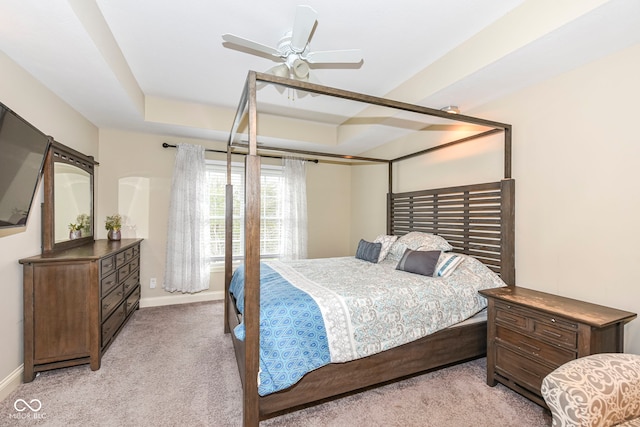 bedroom featuring light colored carpet and ceiling fan