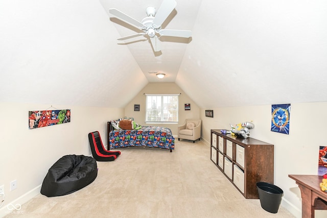 carpeted bedroom featuring ceiling fan and vaulted ceiling