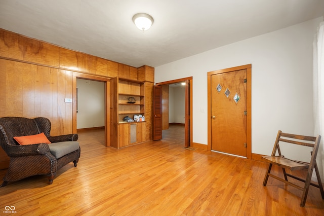 sitting room with light hardwood / wood-style floors