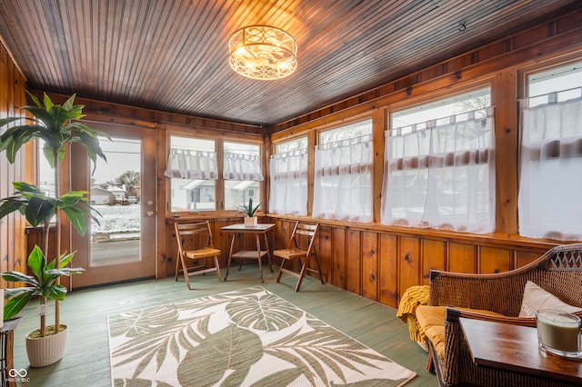 sunroom / solarium featuring wooden ceiling