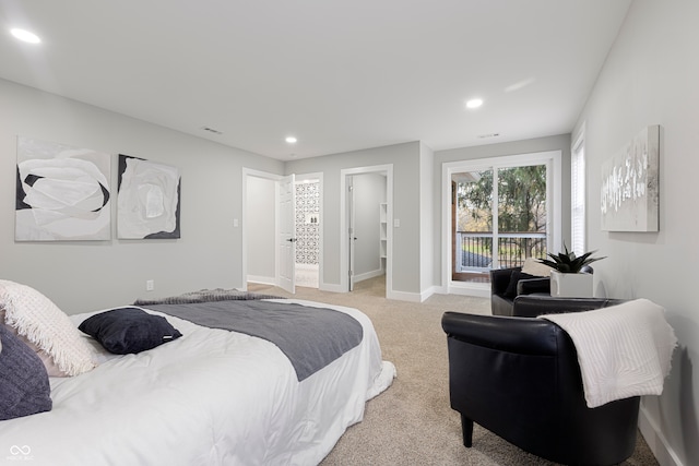 carpeted bedroom with access to exterior