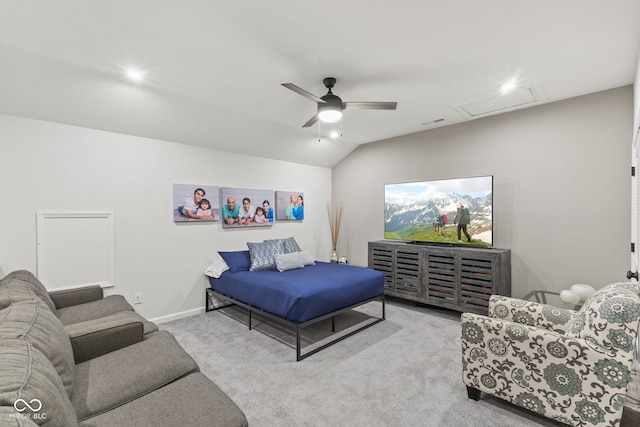 carpeted bedroom featuring ceiling fan and vaulted ceiling