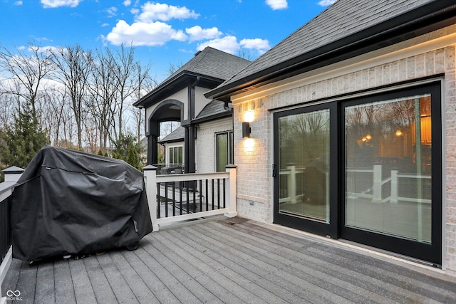 wooden deck featuring grilling area