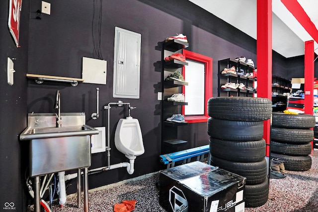 bathroom with electric panel and sink