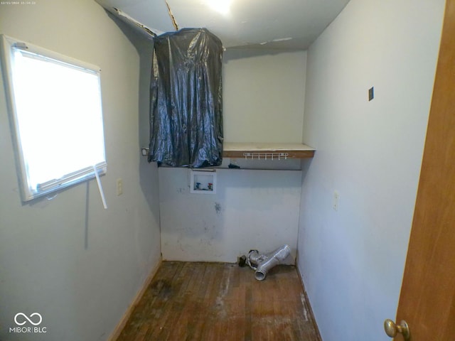 laundry room featuring hookup for a washing machine, dark hardwood / wood-style floors, and a healthy amount of sunlight