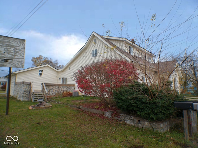 exterior space featuring a front lawn