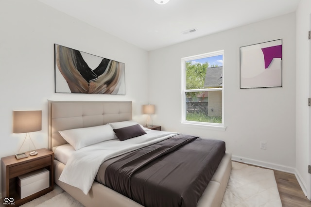 bedroom featuring light hardwood / wood-style floors