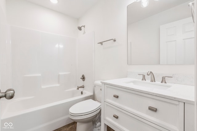 full bathroom with washtub / shower combination, toilet, and vanity