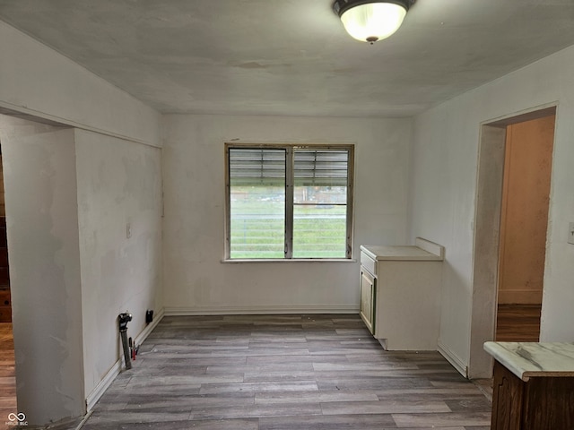 unfurnished room featuring light hardwood / wood-style flooring