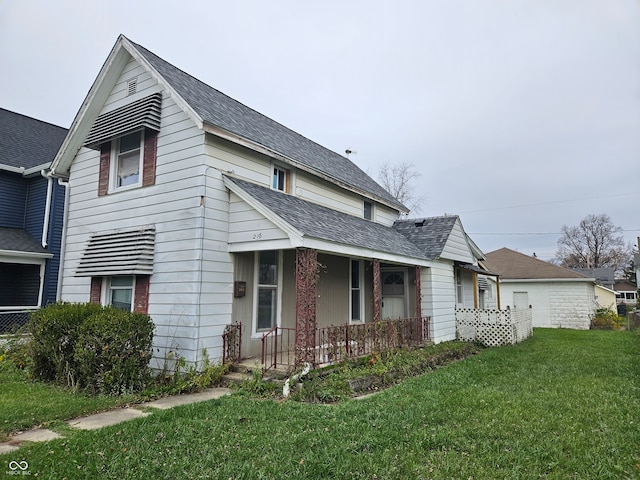 view of side of home with a lawn