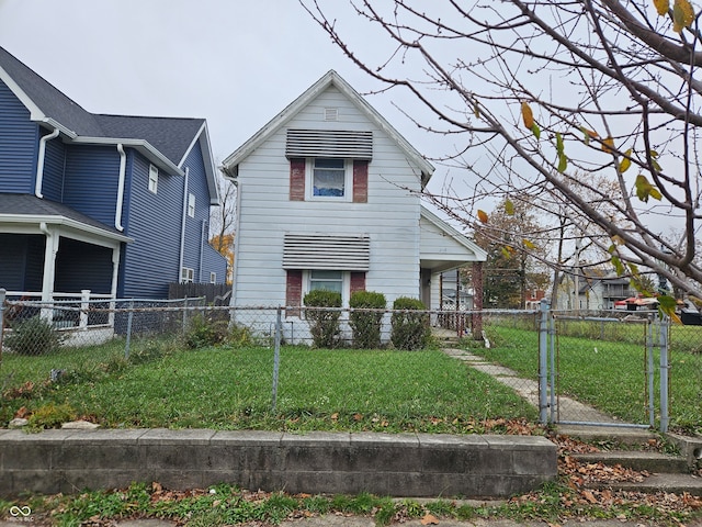 bungalow-style home featuring a front lawn