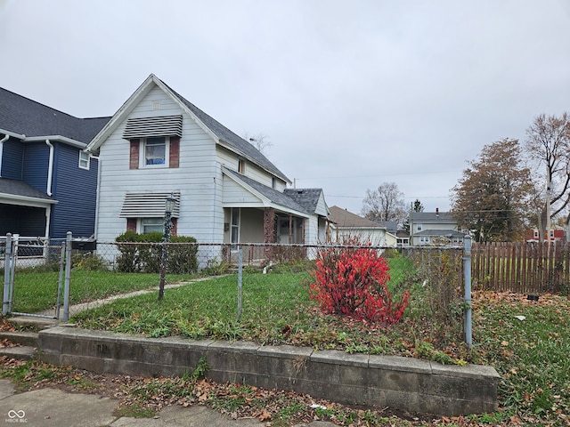 view of side of home featuring a yard