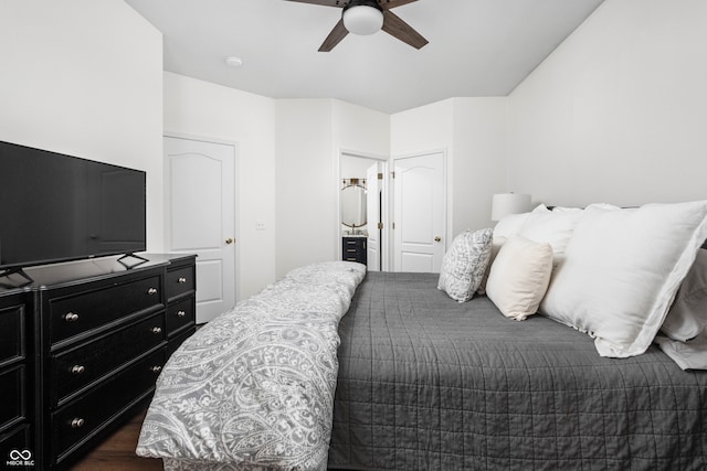 bedroom featuring ceiling fan and dark wood-type flooring