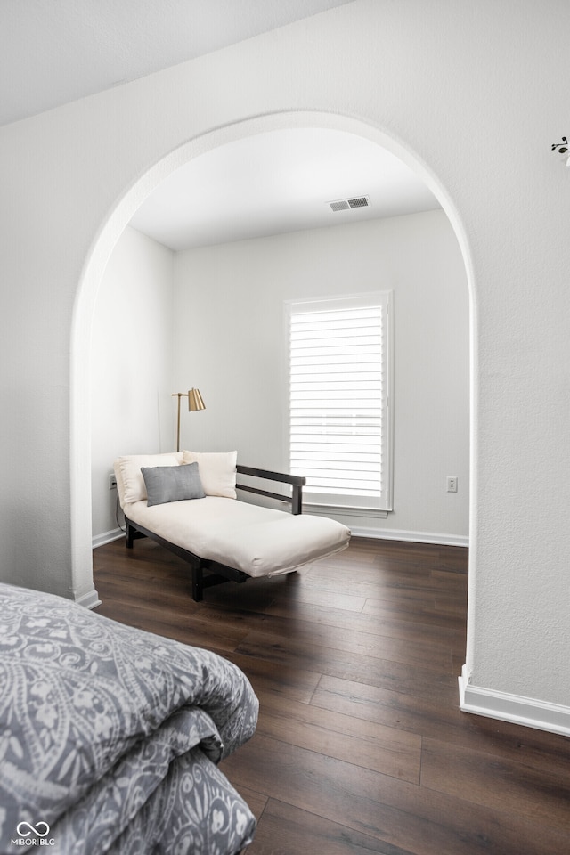 bedroom featuring dark wood-type flooring